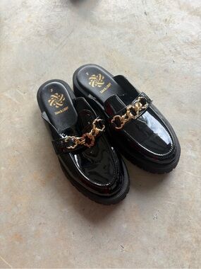Sam & Libby Black Patent Slip-On Mules with Gold Chain